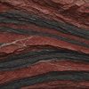 What Causes the Stripes in Banded Iron Formations? Layered banded iron formation showing alternating dark red chert and black hematite bands.